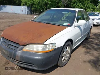 2001 Honda Accord EX z VIN 1HGCG56611A124406, wystawiony jako IAAI lot #42401266 z przebiegiem 177 917 mil mil oraz . Historia ofert i sprzedaży dostępna na DreamBid. Obrazek 2.