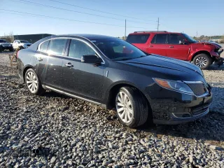 2015 Lincoln MKS z VIN 1LNHL9DK7FG600858, wystawiony jako Copart lot #46167275 z przebiegiem 208 674 mil mil oraz Szkoda całkowita • Salvage title. Historia ofert i sprzedaży dostępna na DreamBid. Obrazek 4.