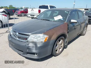 2013 Dodge Avenger SXT with VIN 1C3CDZCB8DN562180, listed as a IAAI auction lot 42000811 with 207,872 mi miles and . Bid and sale history available at carsss.com. Image 15.