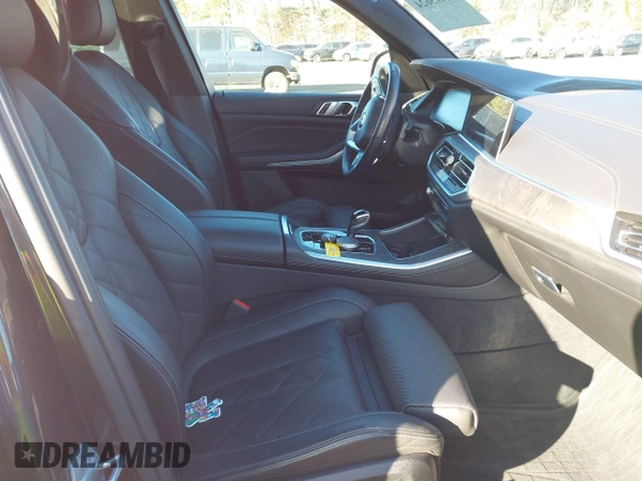 2023 BMW X5 xDrive40i with VIN 5UXCR6C01P9P96005, listed as a IAAI auction lot 41415624 with 15,879 mi miles and . Bid and sale history available at DreamBid. Image 5.