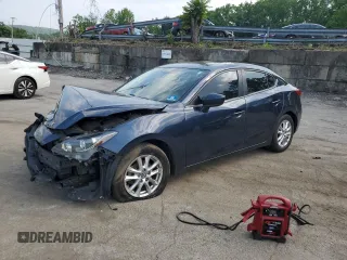 2016 Mazda 3 i Touring with VIN 3MZBM1W74GM257268, listed as a Copart auction lot 60797025 with 139,105 mi miles and Salvage title. Bid and sale history available at DreamBid. Image 1.
