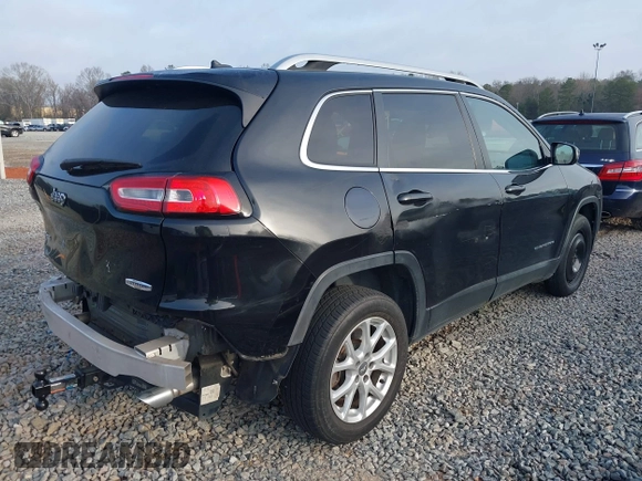 2014 Jeep Cherokee Latitude with VIN 1C4PJMCS7EW180565, listed as a IAAI auction lot 41770555 with 175,629 mi miles and . Bid and sale history available at DreamBid. Image 4.