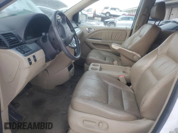 2010 Honda Odyssey EX-L with VIN 5FNRL3H77AB051869, listed as a Copart auction lot 88023625 with 248,511 mi miles and Salvage Title. Bid and sale history available at DreamBid. Image 7.