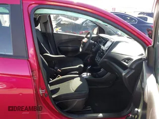 2020 Chevrolet Spark LS with VIN KL8CB6SA2LC410357, listed as a IAAI auction lot 41023593 with 90,587 mi miles. Bid and sale history available at carsss.com. Image 5.