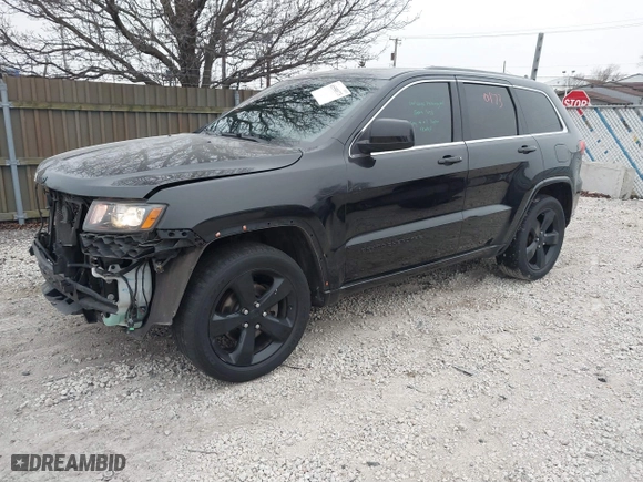 2015 Jeep Grand Cherokee Altitude with VIN 1C4RJFAG1FC210908, listed as a IAAI auction lot 41550173 with 168,905 mi miles. Bid and sale history available at carsss.com. Image 2.