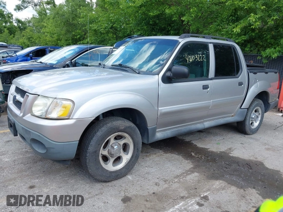 2005 Ford Explorer Sport Trac XLS z VIN 1FMZU77K75UB52008, wystawiony jako IAAI lot #42103222 z przebiegiem 196 605 mil mil oraz . Historia ofert i sprzedaży dostępna na DreamBid. Obrazek 2.