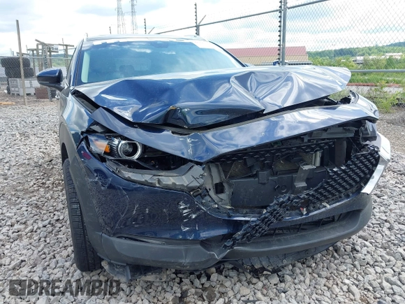 2021 Mazda CX-30 Premium z VIN 3MVDMBDL7MM236474, wystawiony jako IAAI lot #42284515 z przebiegiem 58 565 mil mil oraz . Historia ofert i sprzedaży dostępna na DreamBid. Obrazek 6.