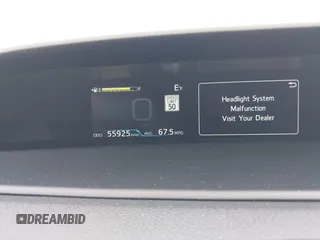 2021 Toyota Prius LE with VIN JTDKAMFP7M3169633, listed as a IAAI auction lot 41986170 with 55,925 mi miles and . Bid and sale history available at DreamBid. Image 7.