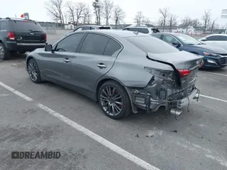 2021 Infiniti Q50 Red Sport 400 with VIN JN1FV7DR9MM880162, listed as a IAAI auction lot 41244912 with 44,943 mi miles and . Bid and sale history available at DreamBid. Image 3.
