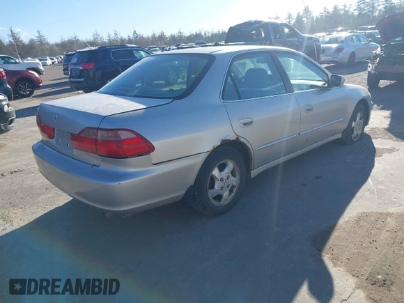 1998 Honda Accord EX z VIN 1HGCG6674WA107380, wystawiony jako IAAI lot #41265496 z przebiegiem 161 006 mil mil oraz . Historia ofert i sprzedaży dostępna na DreamBid. Obrazek 4.