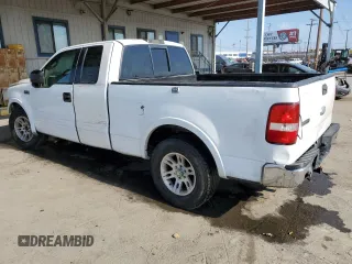 2006 Ford F-150 XLT with VIN 1FTPX12516KB96780, listed as a Copart auction lot 55621015 with 168,831 mi miles and Salvage title. Bid and sale history available at DreamBid. Image 2.