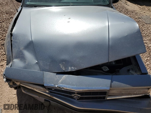 1991 Dodge Dynasty LE z VIN 1B3XC56R9MD115785, wystawiony jako Copart lot #48073715 z przebiegiem 64 483 mil mil oraz Szkoda całkowita • Salvage title. Historia ofert i sprzedaży dostępna na DreamBid. Obrazek 11.