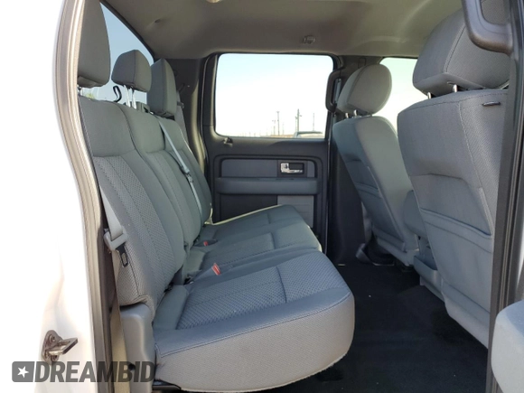2014 Ford F-150 XL with VIN 1FTFW1CT1EKE22892, listed as a Copart auction lot 61635265 with 14,203 mi miles and Salvage title. Bid and sale history available at DreamBid. Image 10.
