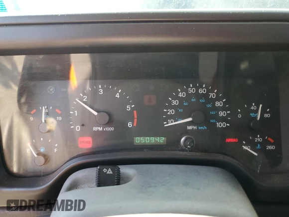 1999 Jeep Wrangler Sport z VIN 1J4FY19SXXP465037, wystawiony jako Copart lot #54772405 z przebiegiem 50 942 mil mil oraz Nie do naprawy • Non repairable. Historia ofert i sprzedaży dostępna na DreamBid. Obrazek 9.
