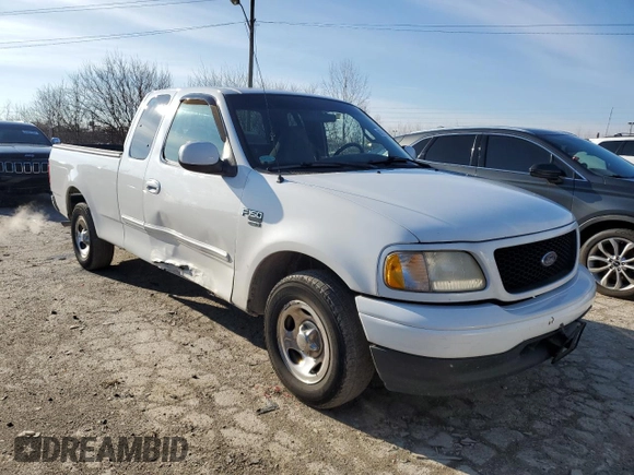 2000 Ford F-150 XL with VIN 1FTRX17L8YNB40935, listed as a Copart auction lot 86726884 with 260,636 mi miles and Salvage Title. Bid and sale history available at carsss.com. Image 4.