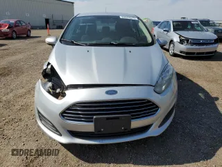 2015 Ford Fiesta SE z VIN 3FADP4EJ0FM212740, wystawiony jako Copart lot #63944573 z przebiegiem 123 037 mil mil oraz Szkoda całkowita • Salvage title. Historia ofert i sprzedaży dostępna na DreamBid. Obrazek 5.