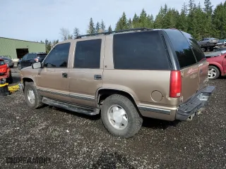1996 Chevrolet Tahoe with VIN 1GNEK13R5TJ420715, listed as a Copart auction lot 48997145 with 303,588 mi miles and Salvage Title. Bid and sale history available at carsss.com. Image 2.