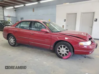 1999 Buick Regal LS with VIN 2G4WB52K0X1589416, listed as a Copart auction lot 82967924 with 0 mi miles and Salvage Title. Bid and sale history available at carsss.com. Image 4.