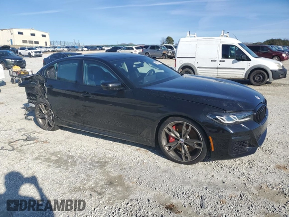 2023 BMW 5 Series M550i xDrive z VIN WBA13BK08PCM88687, wystawiony jako Copart lot #88633545 z przebiegiem Nie podano mil oraz Szkoda całkowita • Salvage title. Historia ofert i sprzedaży dostępna na DreamBid. Obrazek 4.