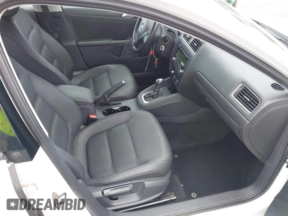 2012 Volkswagen Jetta SE z VIN 3VWDP7AJ7CM350057, wystawiony jako IAAI lot #42499732 z przebiegiem 92 203 mil mil oraz . Historia ofert i sprzedaży dostępna na DreamBid. Obrazek 5.