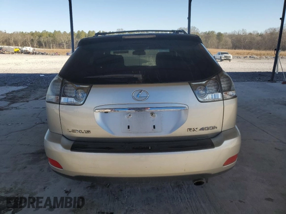 2007 Lexus RX 400h z VIN JTJGW31U972002728, wystawiony jako Copart lot #47637115 z przebiegiem 283 461 mil mil oraz Szkody całkowita. Historia ofert i sprzedaży dostępna na DreamBid. Obrazek 6.