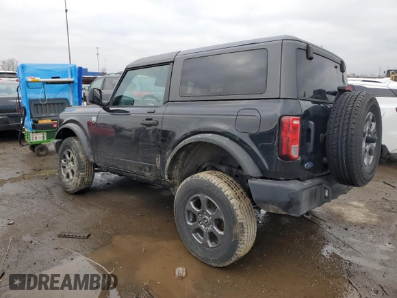 2023 Ford Bronco with VIN 1FMDE5AH6PLB56147, listed as a Copart auction lot 85275394 with 24,594 mi miles and Salvage title. Bid and sale history available at DreamBid. Image 2.