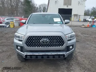 2019 Toyota Tacoma 4WD SR with VIN 5TFCZ5AN8KX168893, listed as a IAAI auction lot 41823745 with 146,557 mi miles. Bid and sale history available at carsss.com. Image 12.