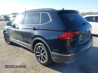 2021 Volkswagen Tiguan SE z VIN 3VV3B7AX0MM080853, wystawiony jako IAAI lot #42406539 z przebiegiem 73 295 mil mil oraz . Historia ofert i sprzedaży dostępna na DreamBid. Obrazek 3.