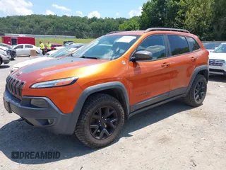2016 Jeep Cherokee Trailhawk with VIN 1C4PJMBS6GW318035, listed as a IAAI auction lot 42652034 with 187,519 mi miles and . Bid and sale history available at DreamBid. Image 17.