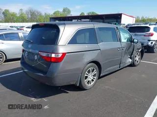 2011 Honda Odyssey EX-L with VIN 5FNRL5H62BB058765, listed as a IAAI auction lot 42017802 with 178,512 mi miles and . Bid and sale history available at carsss.com. Image 4.