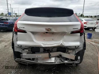 2023 Cadillac XT4 FWD Premium Luxury z VIN 1GYFZCR44PF105116, wystawiony jako Copart lot #51945915 z przebiegiem 20 669 mil mil oraz Szkoda całkowita • Salvage title. Historia ofert i sprzedaży dostępna na DreamBid. Obrazek 6.