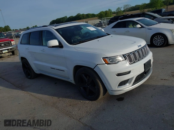 2018 Jeep Grand Cherokee Summit with VIN 1C4RJFJG0JC107732, listed as a IAAI auction lot 42328645 with 109,601 mi miles and . Bid and sale history available at DreamBid. Image 1.