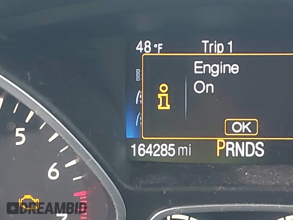 2017 Ford Escape SE z VIN 1FMCU9G95HUA24739, wystawiony jako IAAI lot #41880800 z przebiegiem 164 285 mil mil oraz . Historia ofert i sprzedaży dostępna na DreamBid. Obrazek 15.