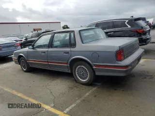 1988 Oldsmobile Cutlass z VIN 2G3AJ5133J2335499, wystawiony jako Copart lot #44587035 z przebiegiem 90 432 mil mil oraz Tytuł czysty. Historia ofert i sprzedaży dostępna na DreamBid. Obrazek 2.