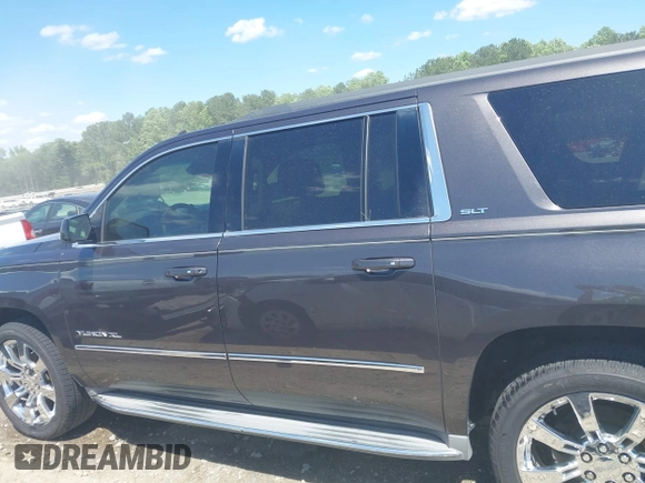 2015 GMC Yukon XL SLT z VIN 1GKS2HKC6FR122234, wystawiony jako IAAI lot #42325984 z przebiegiem 241 008 mil mil oraz . Historia ofert i sprzedaży dostępna na DreamBid. Obrazek 15.