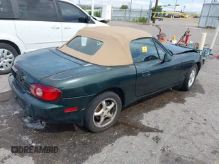 2002 Mazda MX-5 Miata Cloth z VIN JM1NB353720222073, wystawiony jako IAAI lot #42225042 z przebiegiem 94 992 mil mil oraz . Historia ofert i sprzedaży dostępna na DreamBid. Obrazek 4.