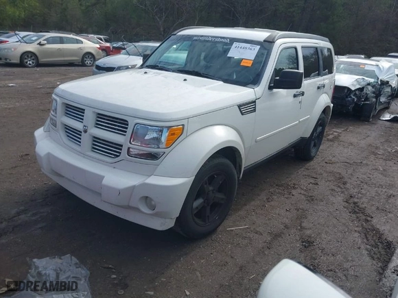 2010 Dodge Nitro SXT with VIN 1D4PU5GK7AW138708, listed as a IAAI auction lot 41440363 with 244,810 mi miles. Bid and sale history available at carsss.com. Image 2.