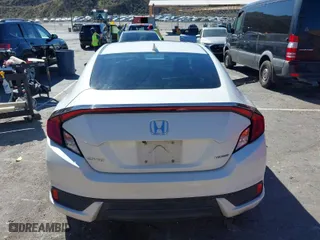 2017 Honda Civic Coupe Touring with VIN 2HGFC3B95HH356466, listed as a IAAI auction lot 41651157 with 100,940 mi miles. Bid and sale history available at carsss.com. Image 16.