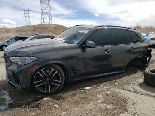 2022 BMW X5 M with VIN 5YMJU0C04N9K13709, listed as a Copart auction lot 49209415 with 46,409 mi miles and Salvage Title. Bid and sale history available at carsss.com. Image 1.