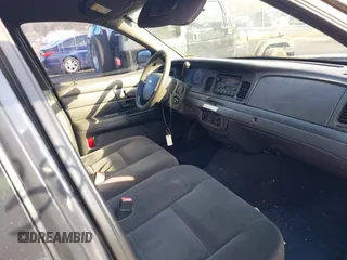 2005 Ford Police Interceptor z VIN 2FAHP71W95X170821, wystawiony jako IAAI lot #41538727 z przebiegiem 115 722 mil mil oraz . Historia ofert i sprzedaży dostępna na DreamBid. Obrazek 5.