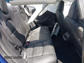 2023 Tesla Model 3 z VIN 5YJ3E1EA2PF506429, wystawiony jako IAAI lot #42320628 z przebiegiem Nie podano mil oraz . Historia ofert i sprzedaży dostępna na DreamBid. Obrazek 8.