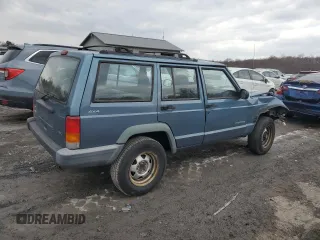 1999 Jeep Cherokee SE with VIN 1J4FF28S9XL576313, listed as a Copart auction lot 88470435 with Not provided miles and Salvage title. Bid and sale history available at DreamBid. Image 3.
