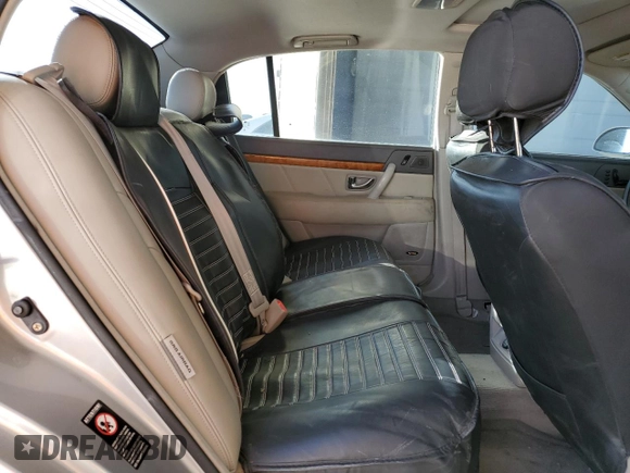 2005 Kia Amanti z VIN KNALD124455058126, wystawiony jako Copart lot #44965465 z przebiegiem 97 698 mil mil oraz Szkoda całkowita • Salvage title. Historia ofert i sprzedaży dostępna na DreamBid. Obrazek 10.