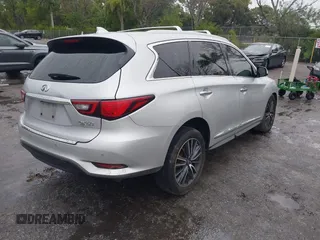 2019 Infiniti QX60 Pure z VIN 5N1DL0MM9KC534133, wystawiony jako IAAI lot #41407744 z przebiegiem 215 402 mil mil oraz . Historia ofert i sprzedaży dostępna na DreamBid. Obrazek 4.