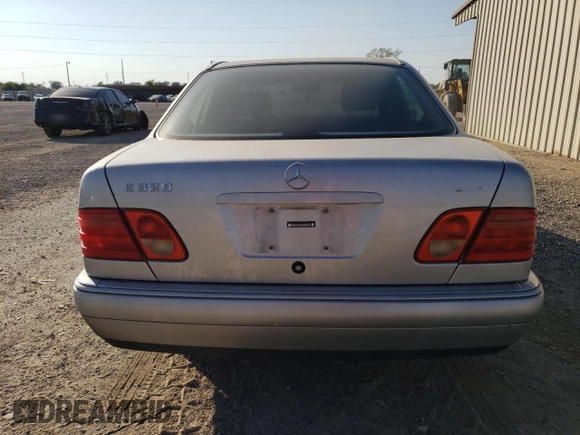 1998 Mercedes-Benz E-Class with VIN WDBJF65F1WA711193, listed as a Copart auction lot 76052034 with 168,935 mi miles and Salvage Title. Bid and sale history available at carsss.com. Image 6.