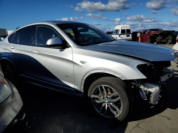 2018 BMW X4 xDrive28i with VIN 5UXXW3C58J0T81232, listed as a Copart auction lot 69434422 with 50,901 mi miles. Bid and sale history available at carsss.com. Image 4.