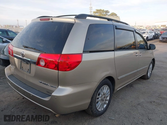 2007 Toyota Sienna XLE with VIN 5TDZK22C97S062721, listed as a IAAI auction lot 41900786 with 220,189 mi miles. Bid and sale history available at carsss.com. Image 4.