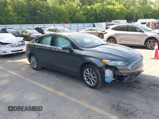 2017 Ford Fusion SE z VIN 3FA6P0H77HR339153, wystawiony jako IAAI lot #42491876 z przebiegiem 87 656 mil mil oraz . Historia ofert i sprzedaży dostępna na DreamBid. Obrazek 1.