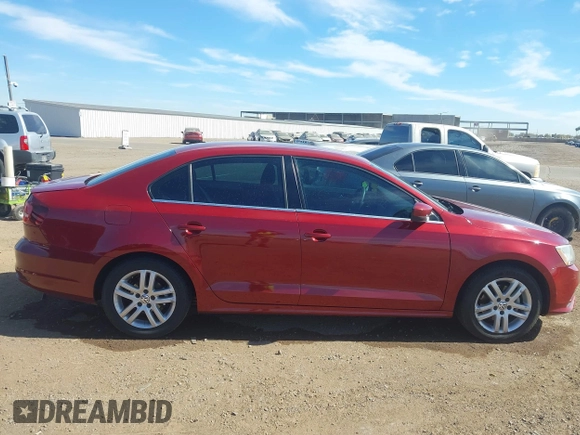 2017 Volkswagen Jetta S z VIN 3VW2B7AJ2HM207207, wystawiony jako IAAI lot #41654971 z przebiegiem 73 427 mil mil oraz . Historia ofert i sprzedaży dostępna na DreamBid. Obrazek 13.