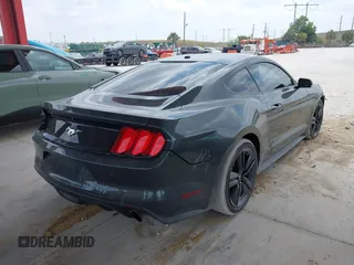 2016 Ford Mustang EcoBoost with VIN 1FA6P8TH2G5218580, listed as a IAAI auction lot 42044827 with 76,173 mi miles and . Bid and sale history available at carsss.com. Image 4.